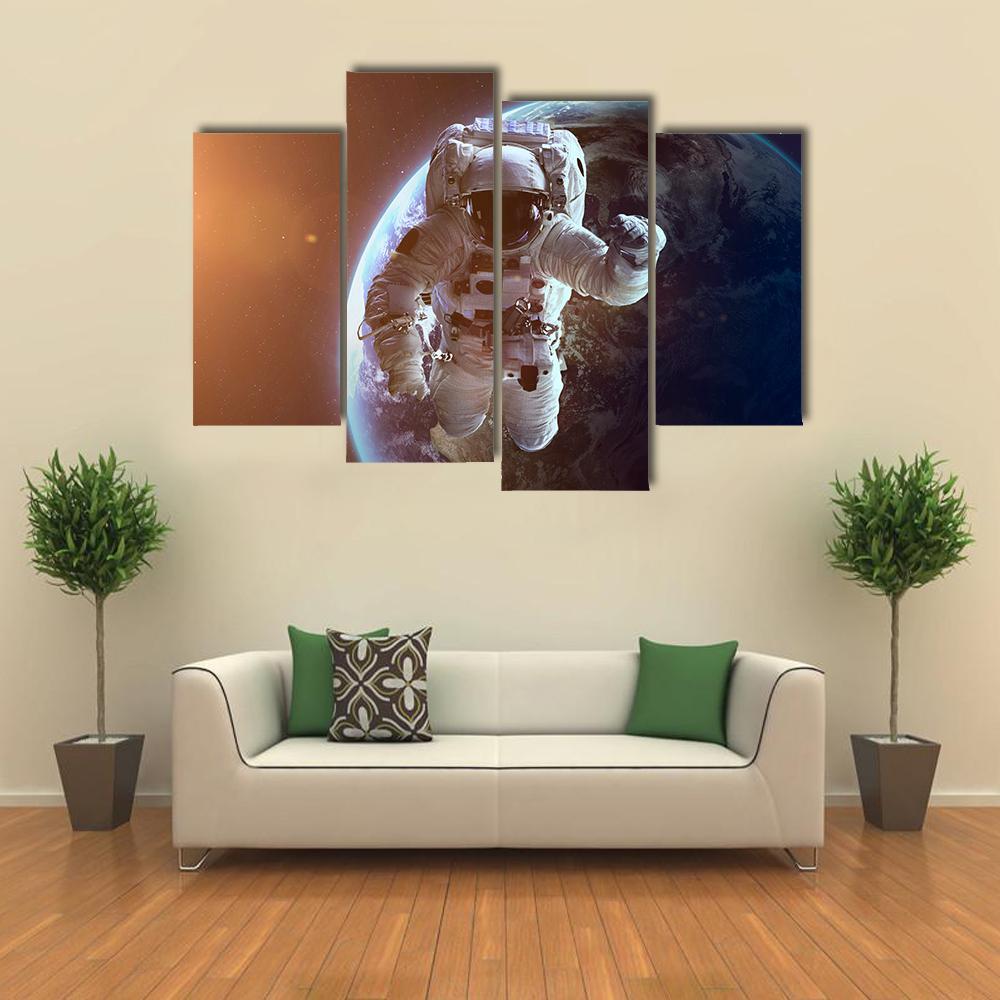 Astronaut Near Planet Earth Canvas Wall Art-4 Pop-Gallery Wrap-50" x 32"-Tiaracle
