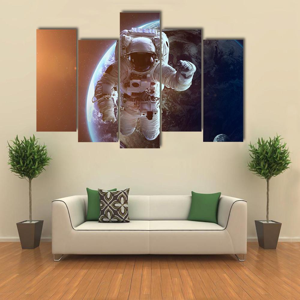 Astronaut Near Planet Earth Canvas Wall Art-5 Pop-Gallery Wrap-47" x 32"-Tiaracle