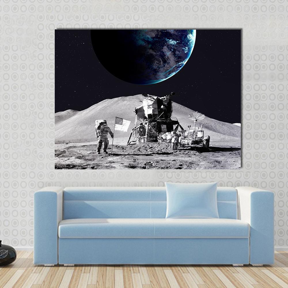 Astronaut on the Moon Canvas Wall Art in black, gray and blue, single panel hung on a wall
