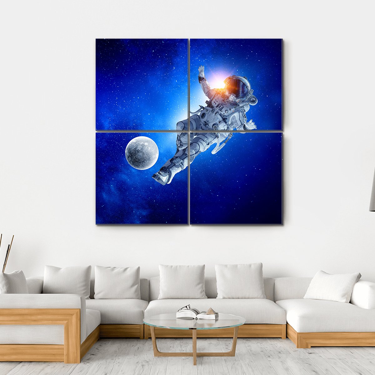Astronaut Playing Soccer in Space Canvas Wall Art in black, white and blue, hung on a wall