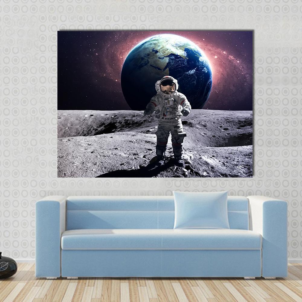 Astronaut Spacewalk Canvas Wall Art in black, gray and blue, single panel hung on a wall