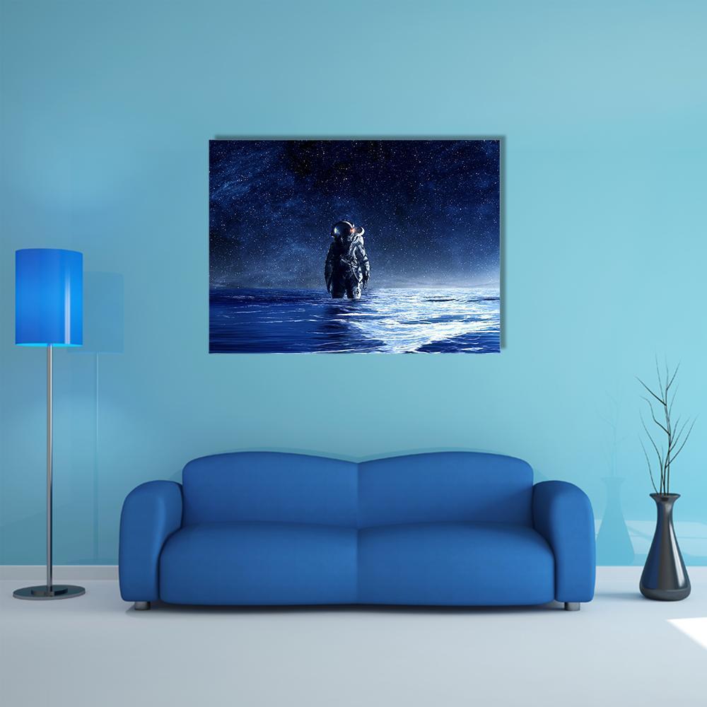 Astronaut Standing in Water Canvas Wall Art in black, blue and navy, single panel hung on a wall
