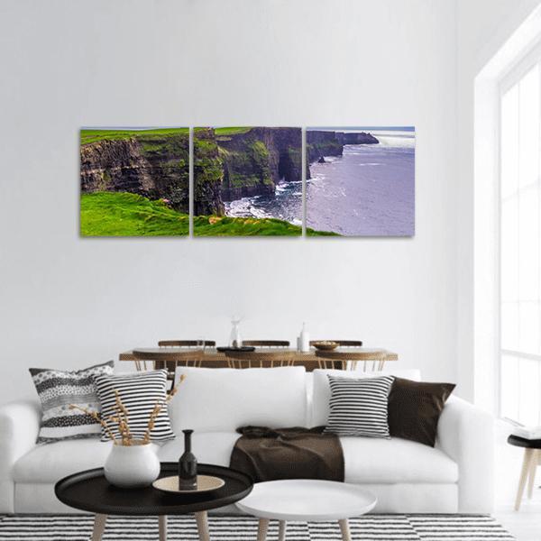 Atlantic Coast Cliffs, Ireland Panoramic Canvas Wall Art in gray, green and blue, hung on a wall