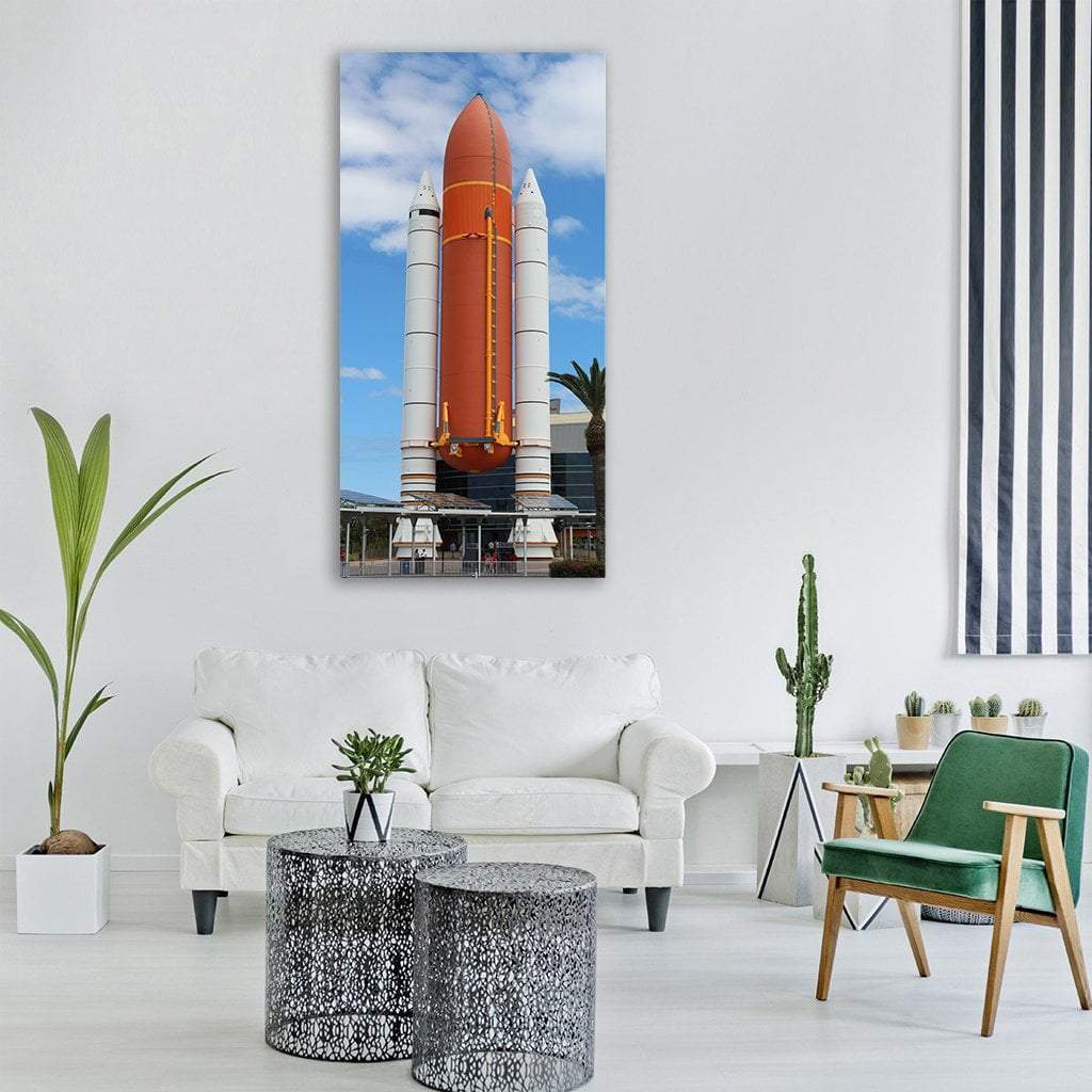Atlantis Space Shuttle Launch Vertical Canvas Wall Art in white, orange and blue, single vertical panel hung on a wall