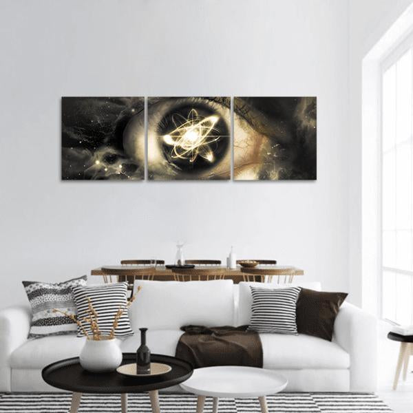 Atomic Iris with Orbital Rings Panoramic Canvas Wall Art in black, gold and yellow, hung on a wall