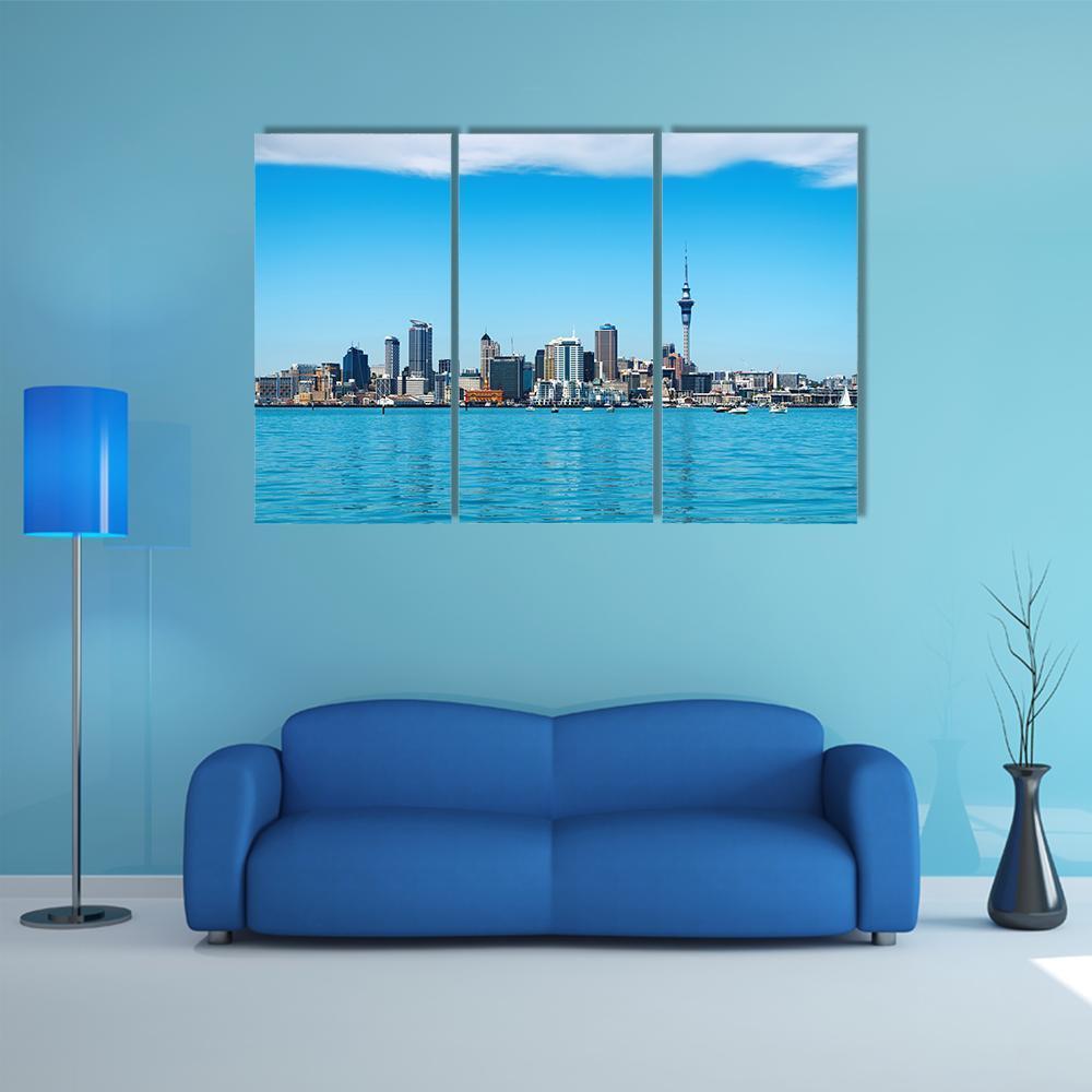 Auckland City Skyline Canvas Wall Art in white and blue, 3 panel horizontal set hung on a wall