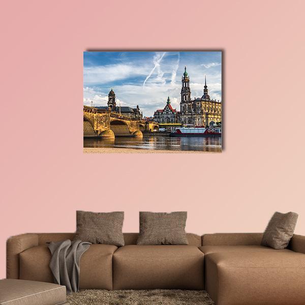 Augustus Bridge and Trinity Cathedral Canvas Wall Art in beige, brown and blue, single panel hung on a wall