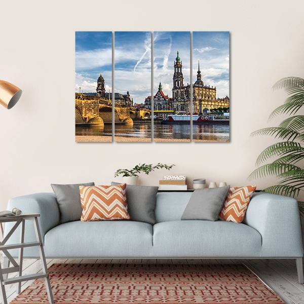 Augustus Bridge and Trinity Cathedral Canvas Wall Art in white, brown and blue, single panel hung on a wall
