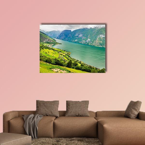 Aurland Valley and Fjords Canvas Wall Art in green and blue, single panel hung on a wall