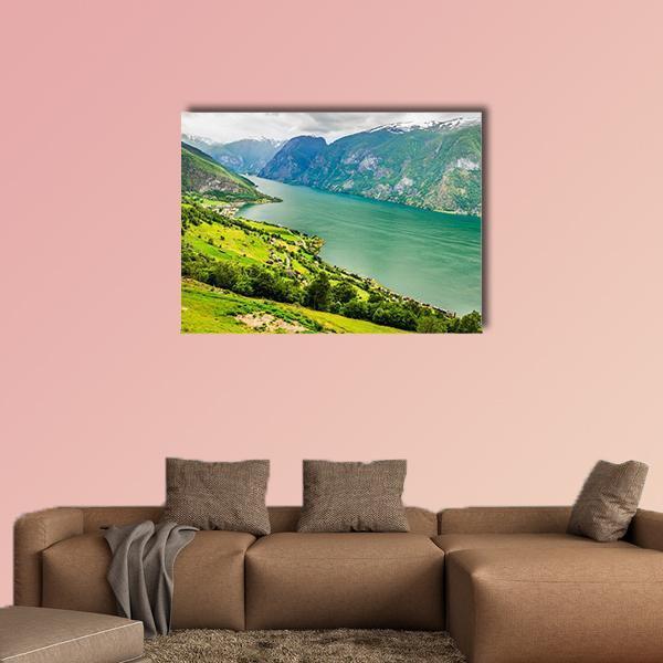 Aurland Valley and Fjords Canvas Wall Art in green and blue, single panel hung on a wall