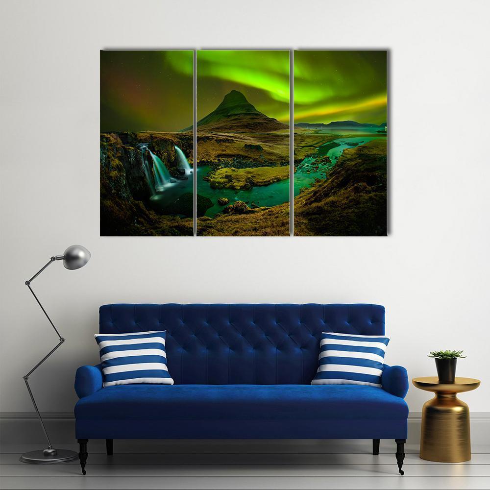 Aurora Over Kirkjufell Waterfall Canvas Wall Art in black, brown and green, 5 panel Pop layout hung on a wall
