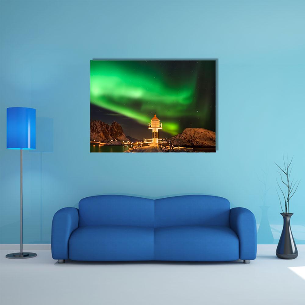 Swirling Aurora Above Lofoten Lighthouse Canvas Wall Art in black and green, single panel hung on a wall