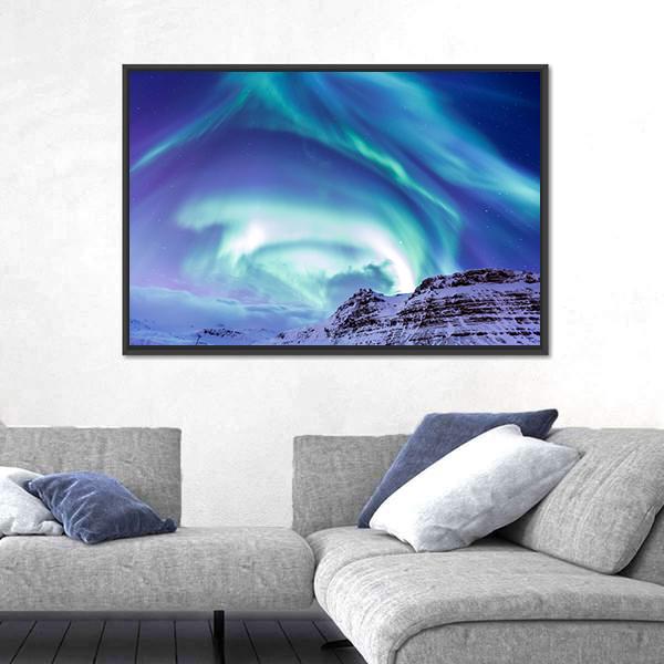 Aurora Over Kirkjufell Canvas Wall Art in green, blue and purple, framed canvas, product view on a white background