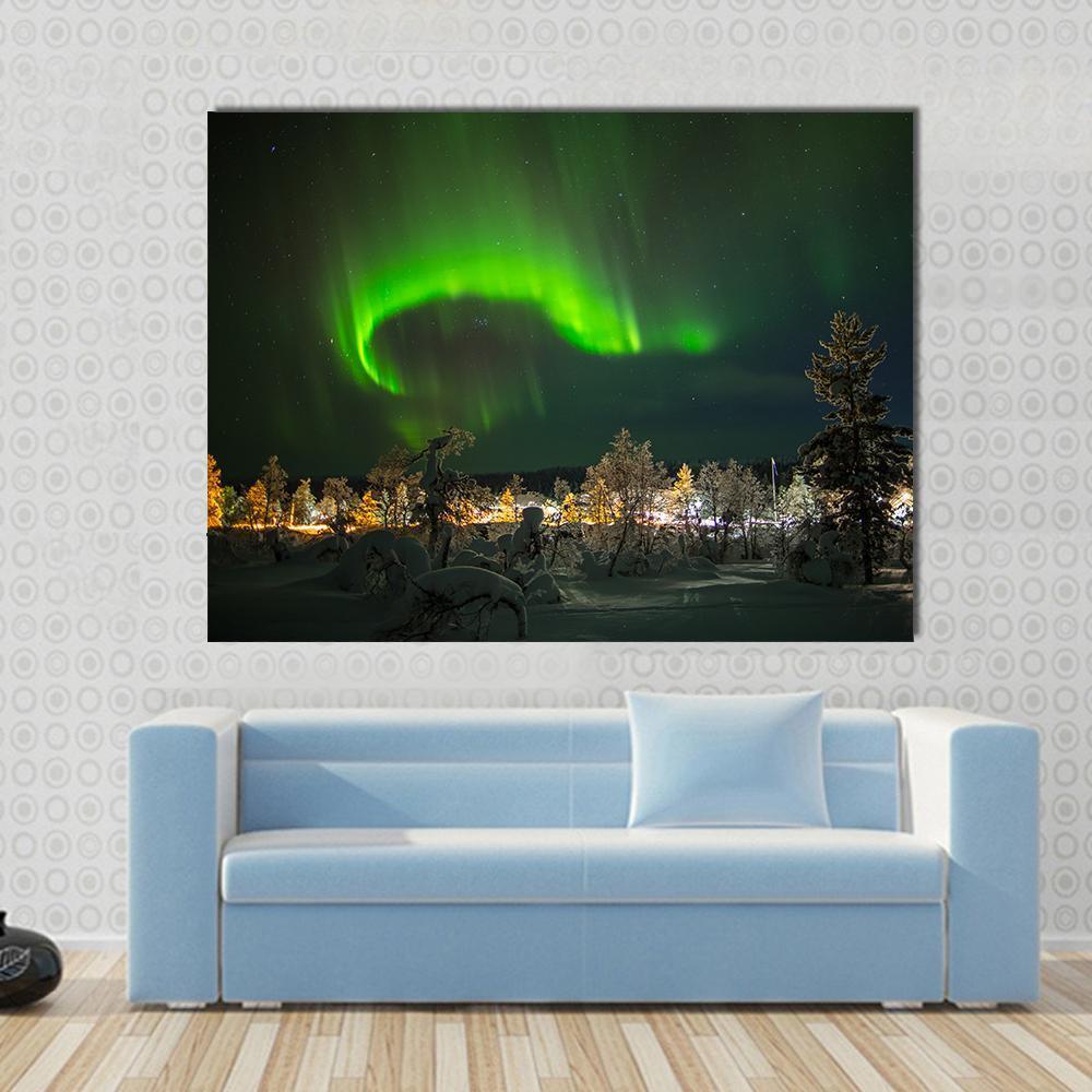 Aurora Borealis in Lapland Canvas Wall Art in black and green, single panel hung on a wall