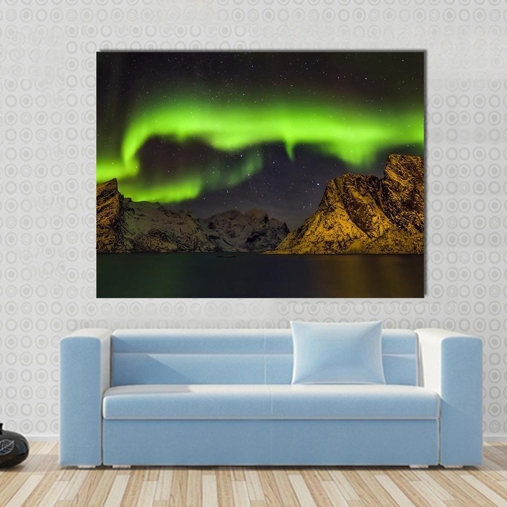 Aurora Borealis Lofoten Islands Canvas Wall Art in black, yellow and green, 3 panel horizontal set hung on a wall