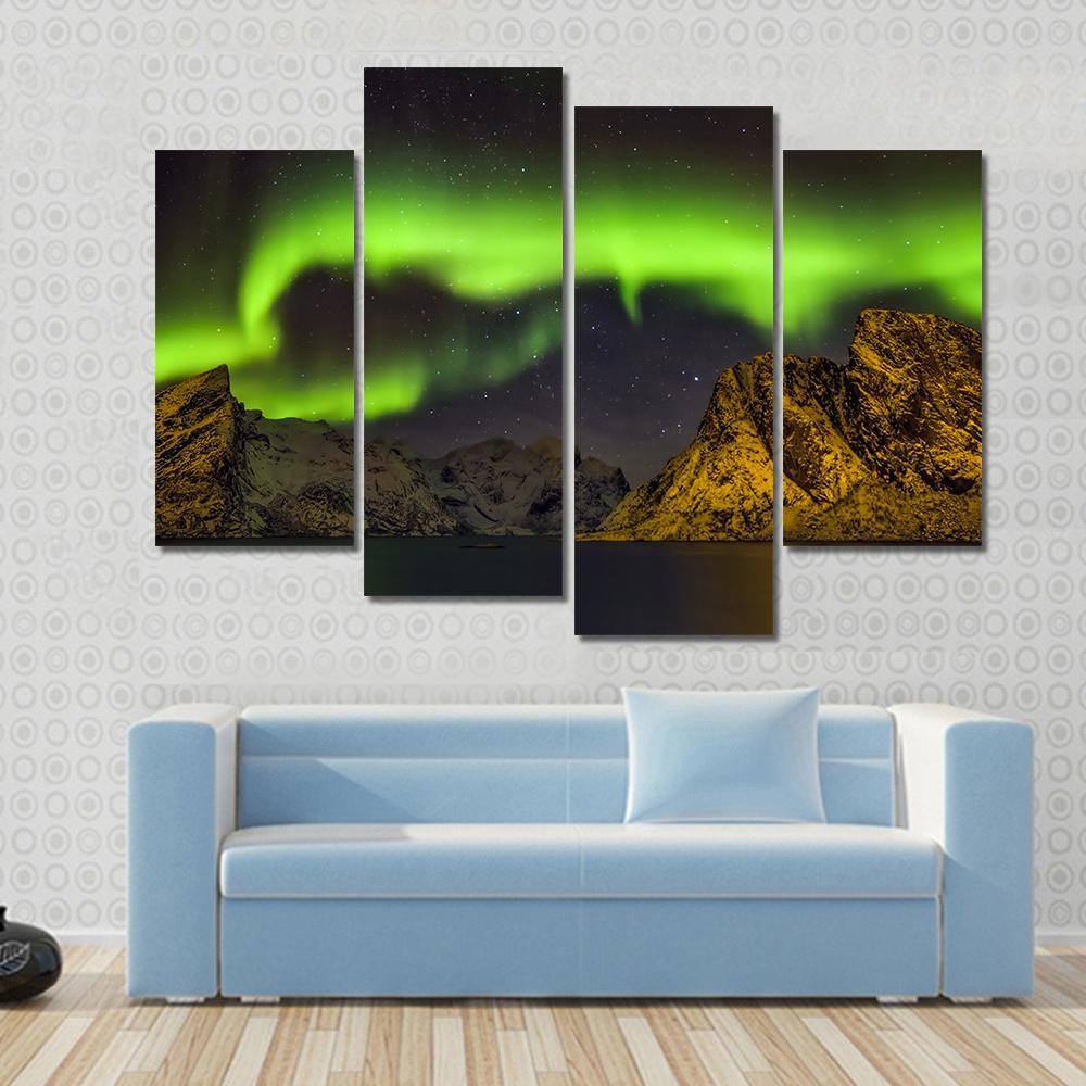 Aurora Borealis Lofoten Islands Canvas Wall Art in black, yellow and green, 3 panel horizontal set hung on a wall
