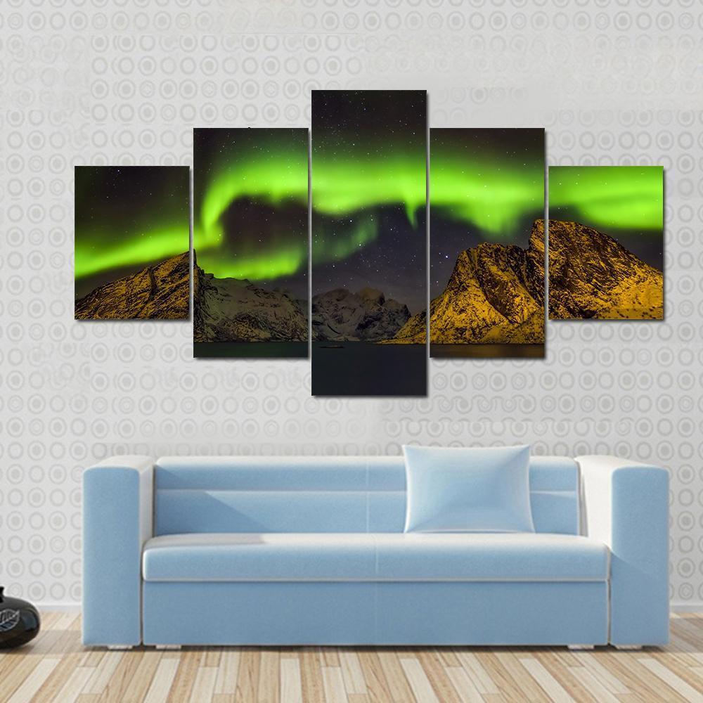 Aurora Borealis Lofoten Islands Canvas Wall Art in black, yellow and green, 3 panel horizontal set hung on a wall