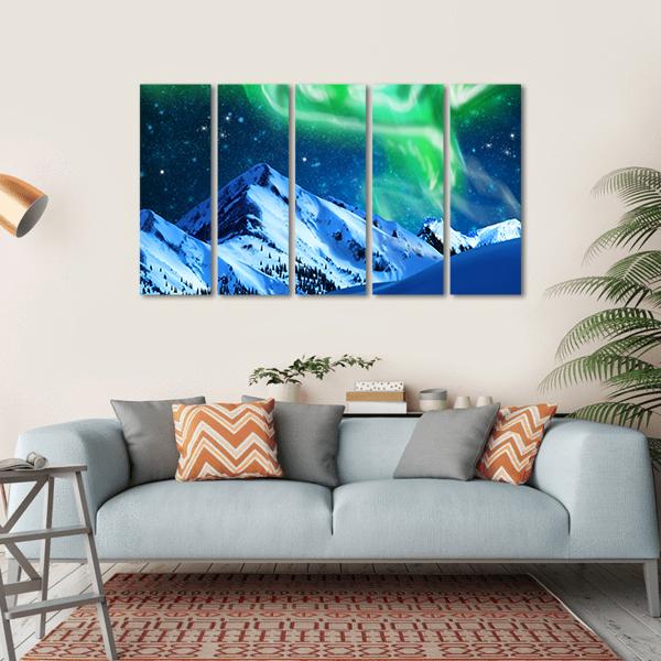 Aurora Over Snowy Mountains Canvas Wall Art in white, green and blue, hung on a wall