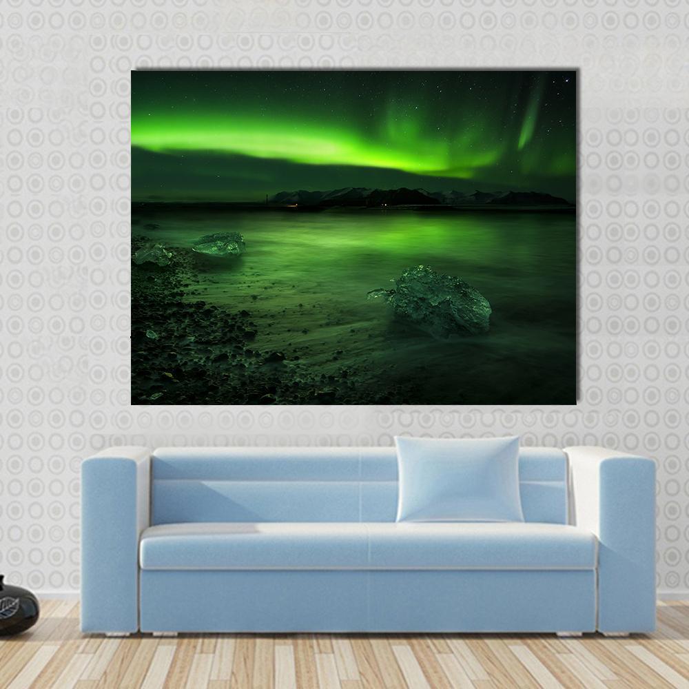 Aurora Northern Lights Canvas Wall Art in black and green, 4 panel Pop layout hung on a wall