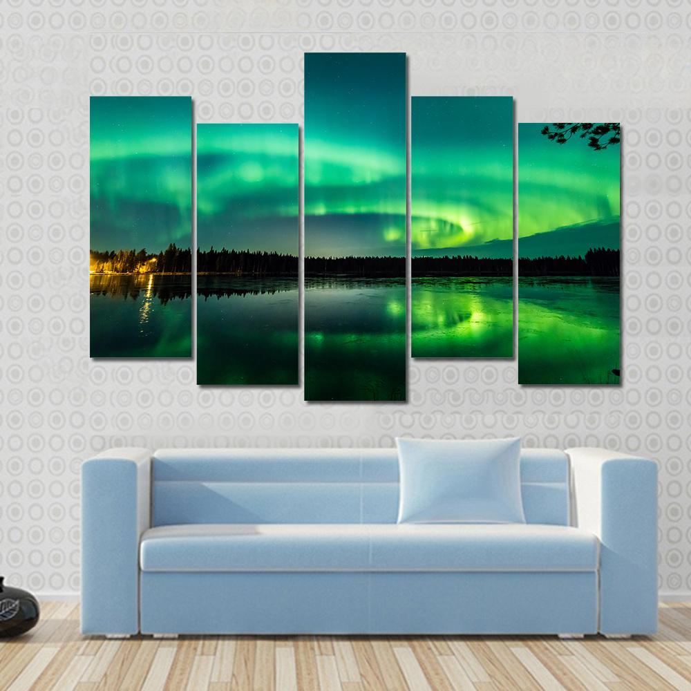Aurora Over Finnish Lake Canvas Wall Art in black and green, 5 panel Pop layout hung on a wall