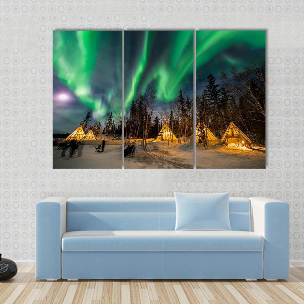 Aurora Village Canvas Wall Art in black, yellow and green, 4 panel Pop layout hung on a wall