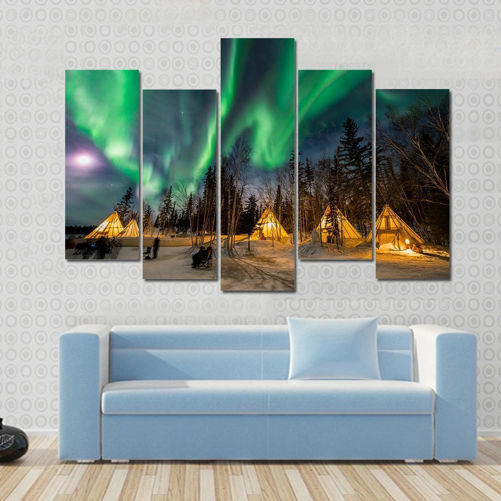Aurora Village Canvas Wall Art in black, yellow and green, 4 panel Pop layout hung on a wall
