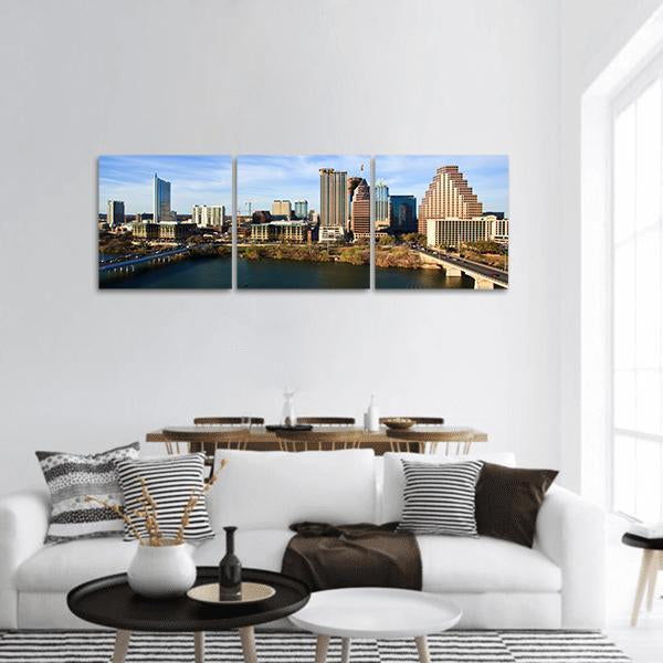 Austin Skyline Over Lady Bird Lake Panoramic Canvas Wall Art in gray, brown and blue, hung on a wall