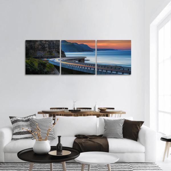 Australian Pacific Coast at Sunset Panoramic Canvas Wall Art in gray, orange and blue, hung on a wall