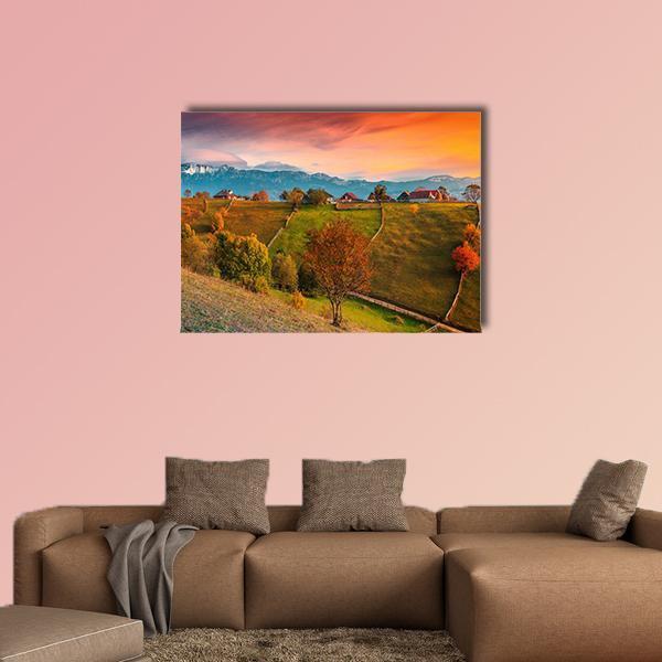 Autumn Alpine Landscape Romania Canvas Wall Art in orange, yellow and green, single panel hung on a wall