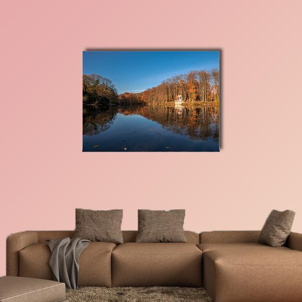 Deuss Temple in Autumn Canvas Wall Art in brown, orange and blue, single panel hung on a wall