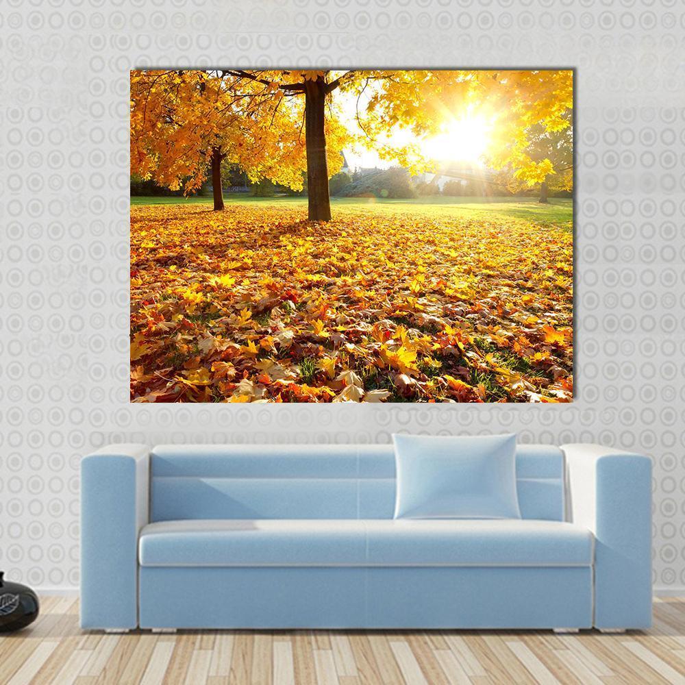 Autumn Fallen Leaves Canvas Wall Art in brown, orange and yellow, single panel hung on a wall