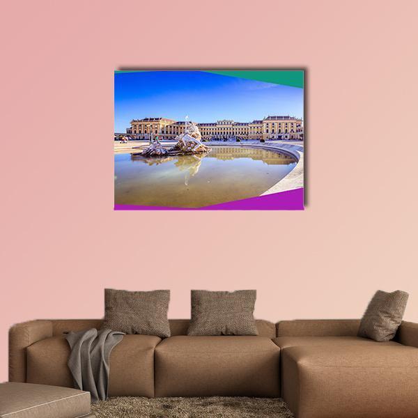 Palace Garden with Ornate Fountain Canvas Wall Art in beige, yellow and blue, single panel hung on a wall