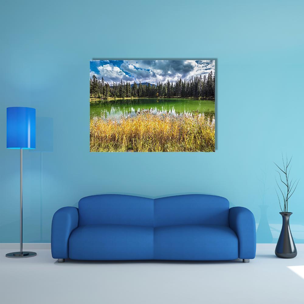 Autumn Lake in Jasper National Park Canvas Wall Art in yellow, green and blue, single panel hung on a wall