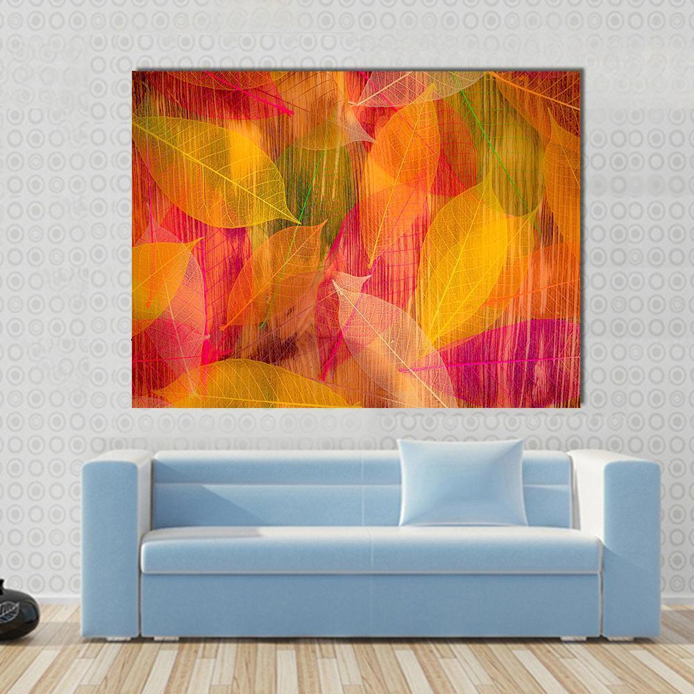 Autumn Leaves Abstract Canvas Wall Art in red, orange and yellow, single panel hung on a wall