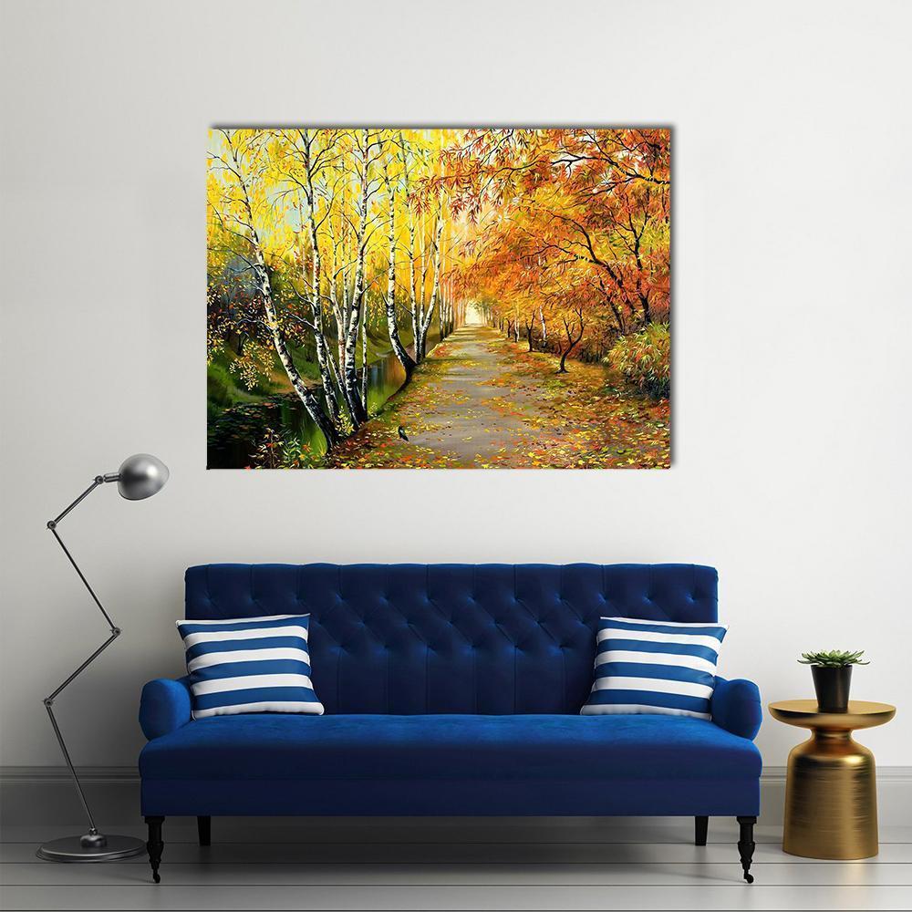Autumn Road Along the Stream Canvas Wall Art in orange, yellow and green, single panel hung on a wall