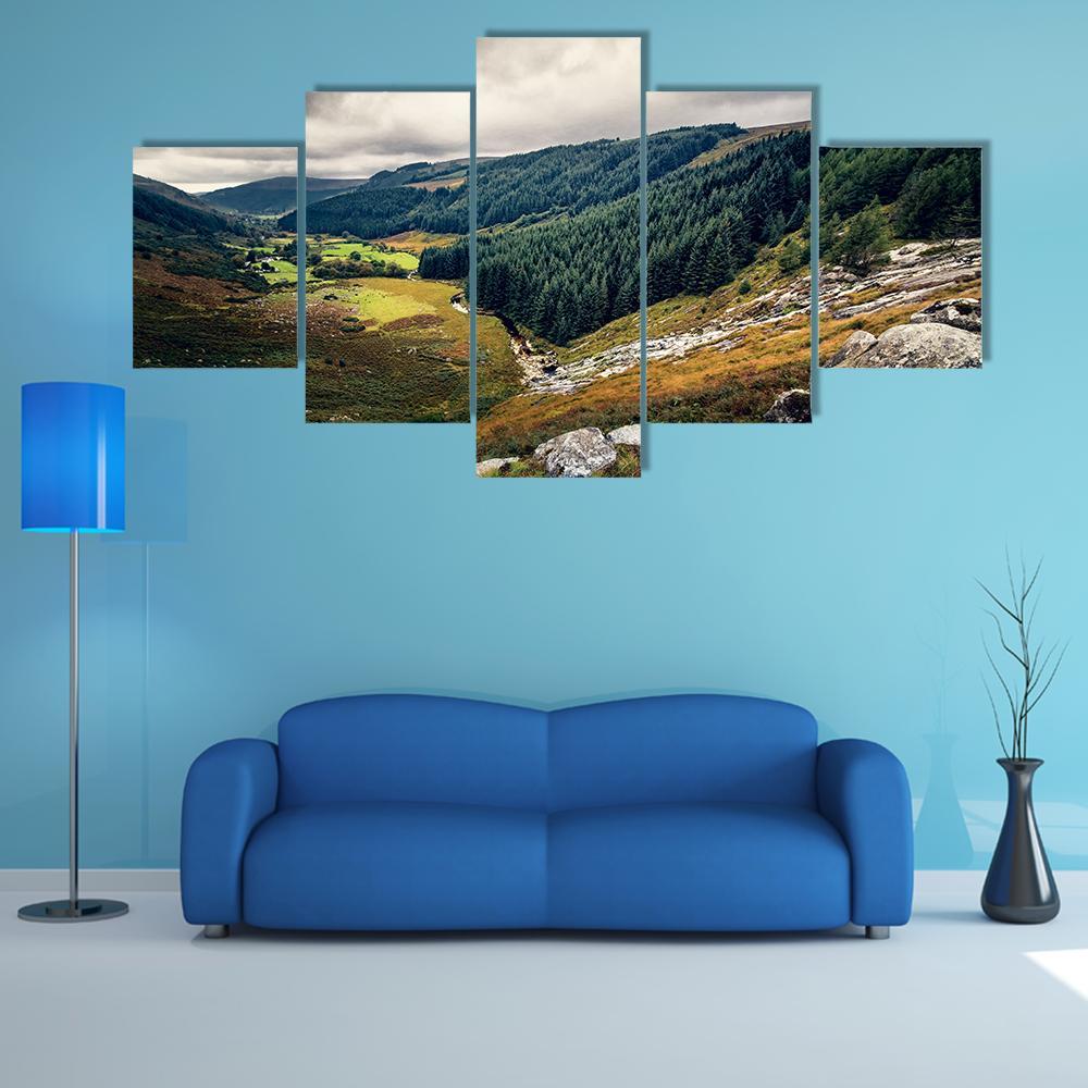 Glenmacnass Waterfall Canvas Wall Art in gray, brown and green, 5 panel Star layout hung on a wall