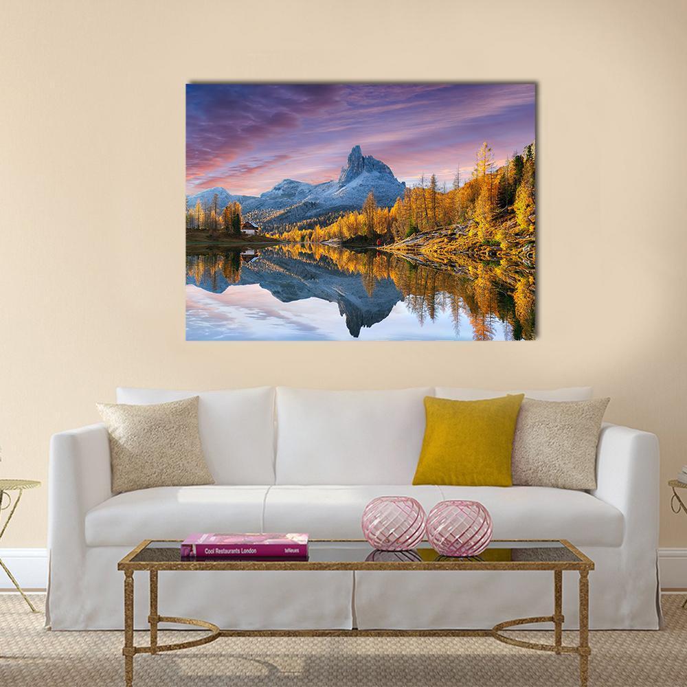 Autumn Lake in the Dolomites Canvas Wall Art in orange, yellow and blue, single panel hung on a wall