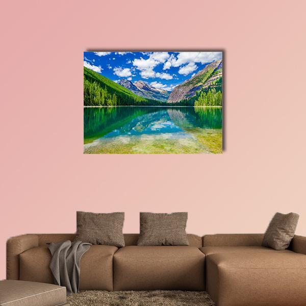 Avalanche Lake in Montana Canvas Wall Art in white, green and blue, single panel hung on a wall