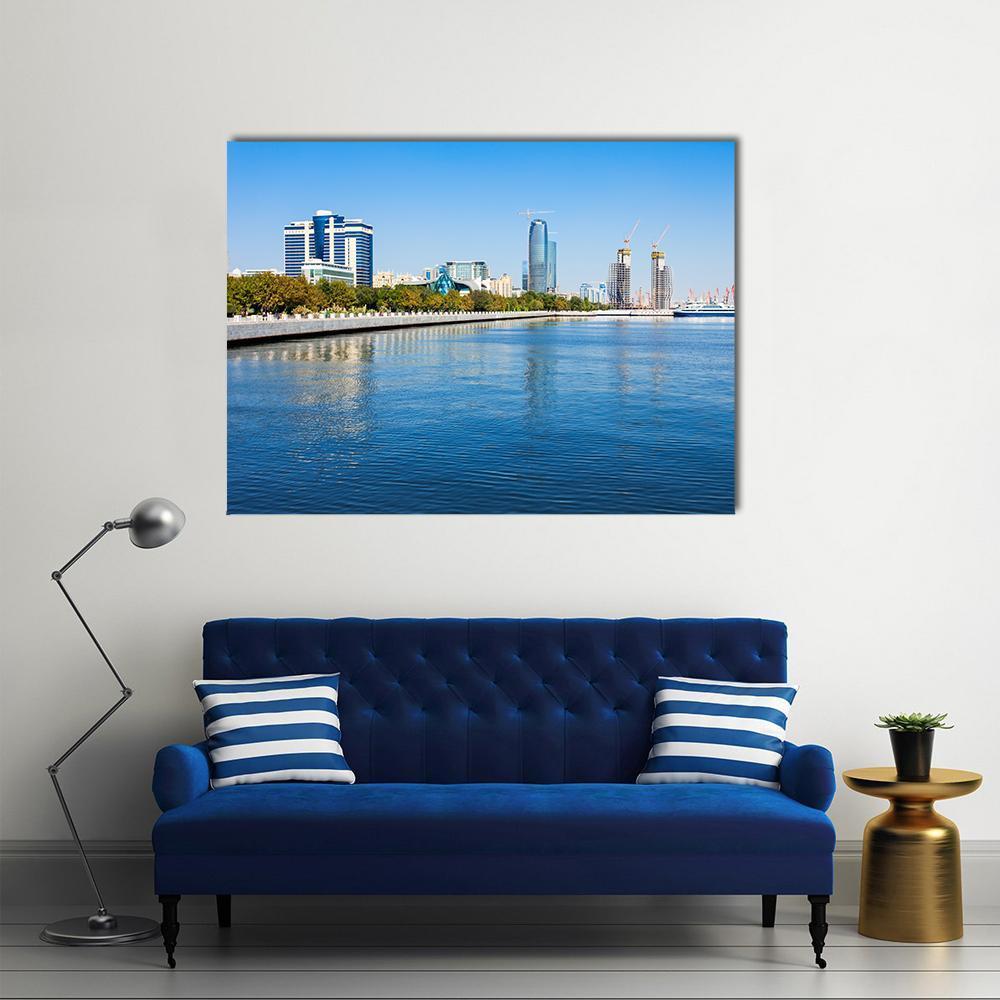 Azerbaijan Waterfront Skyline Canvas Wall Art in white and blue, single panel hung on a wall
