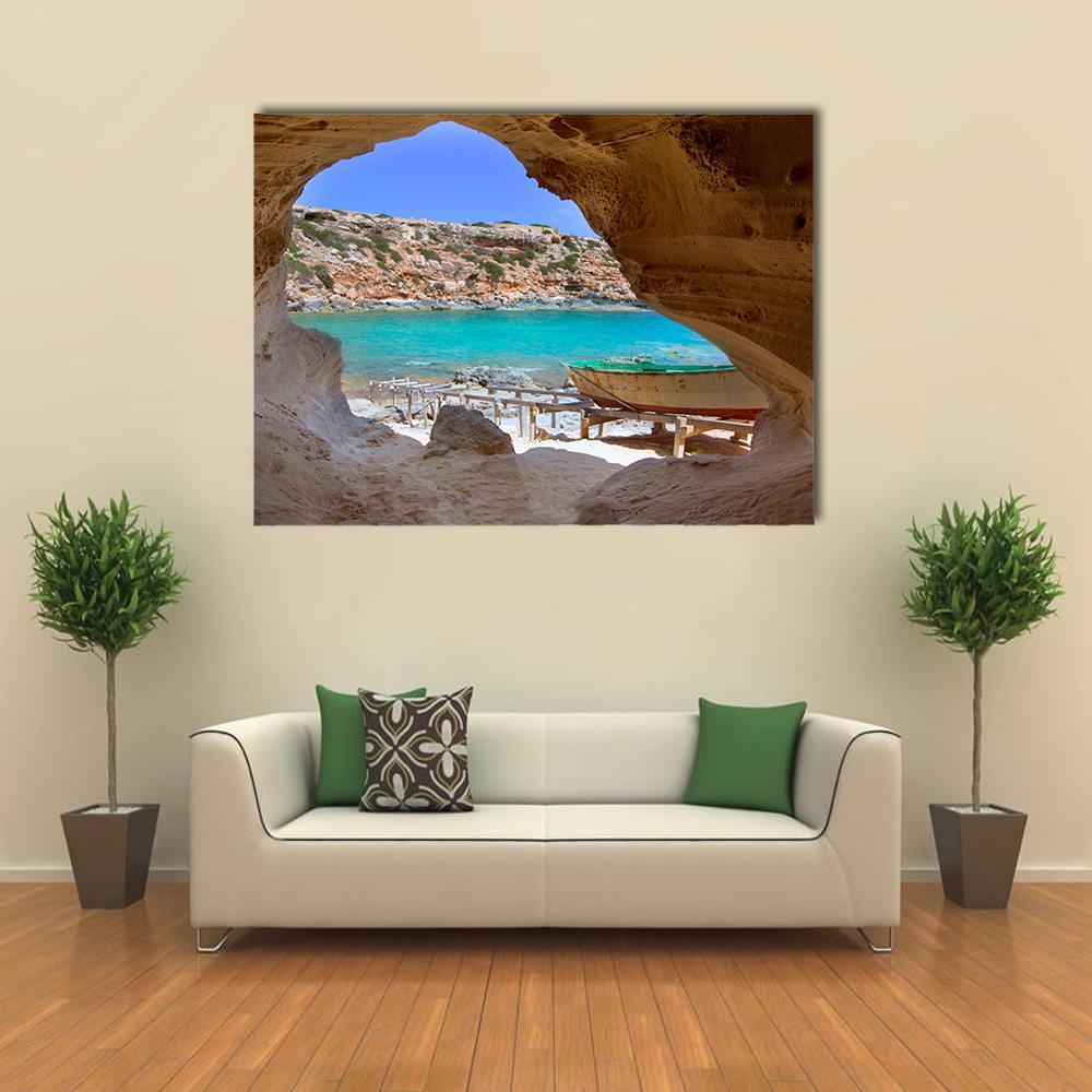 Cala En Baster, Spain Landscape Canvas Wall Art in beige, brown and blue, single panel hung on a wall