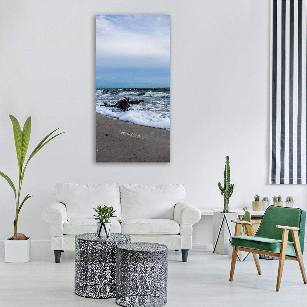 Baltic Sea Beach Vertical Canvas Wall Art in gray, beige and blue, single vertical panel hung on a wall