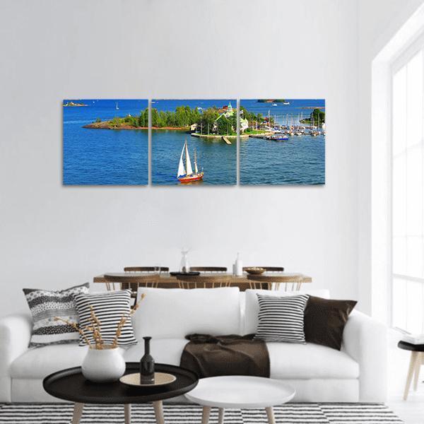 Red Sailboat at Baltic Sea Marina, Helsinki Panoramic Canvas Wall Art in green and blue, hung on a wall