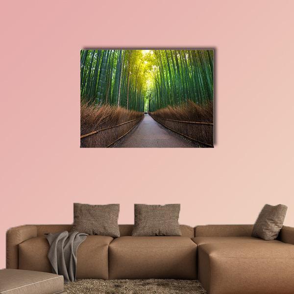 Sunlit Bamboo Forest Path in Japan Canvas Wall Art in brown, yellow and green, single panel hung on a wall