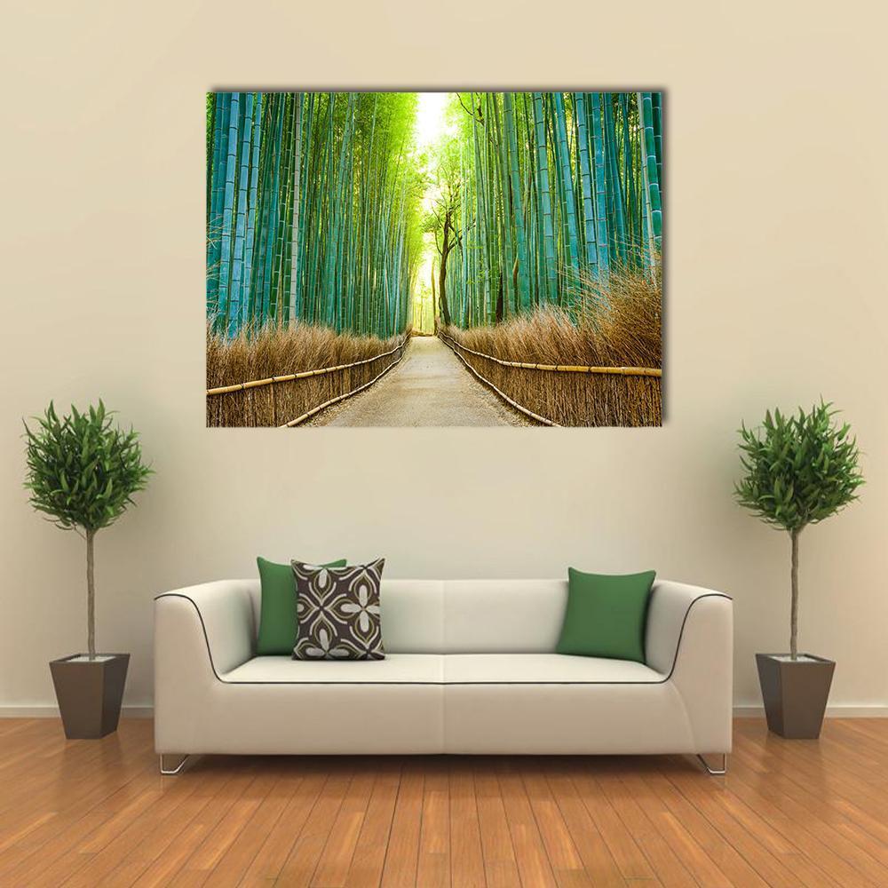 Tranquil Bamboo Forest Path Canvas Wall Art in brown, yellow and green, single panel hung on a wall