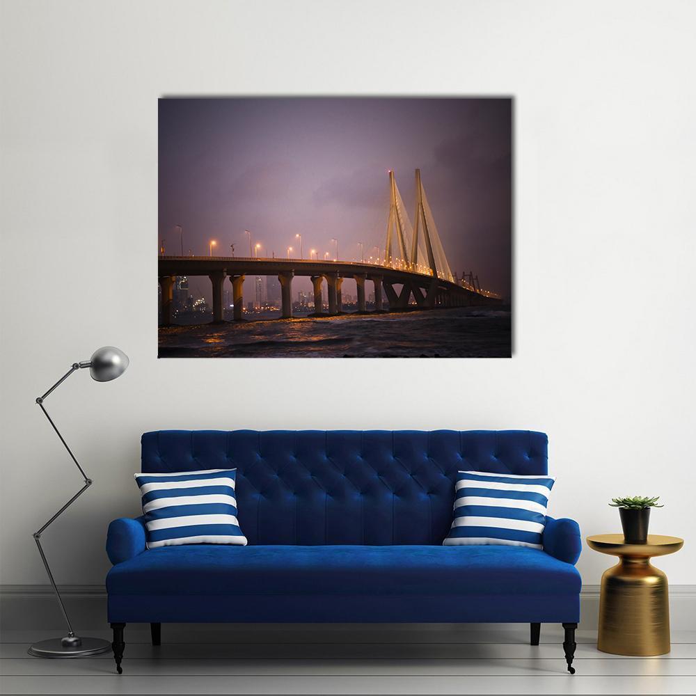 Bandra-worli Sea Link Night View Canvas Wall Art in black, yellow and purple, single panel hung on a wall