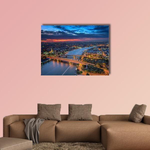 Bangkok Twilight Over Dual Bridges Canvas Wall Art in orange, yellow and blue, single panel hung on a wall