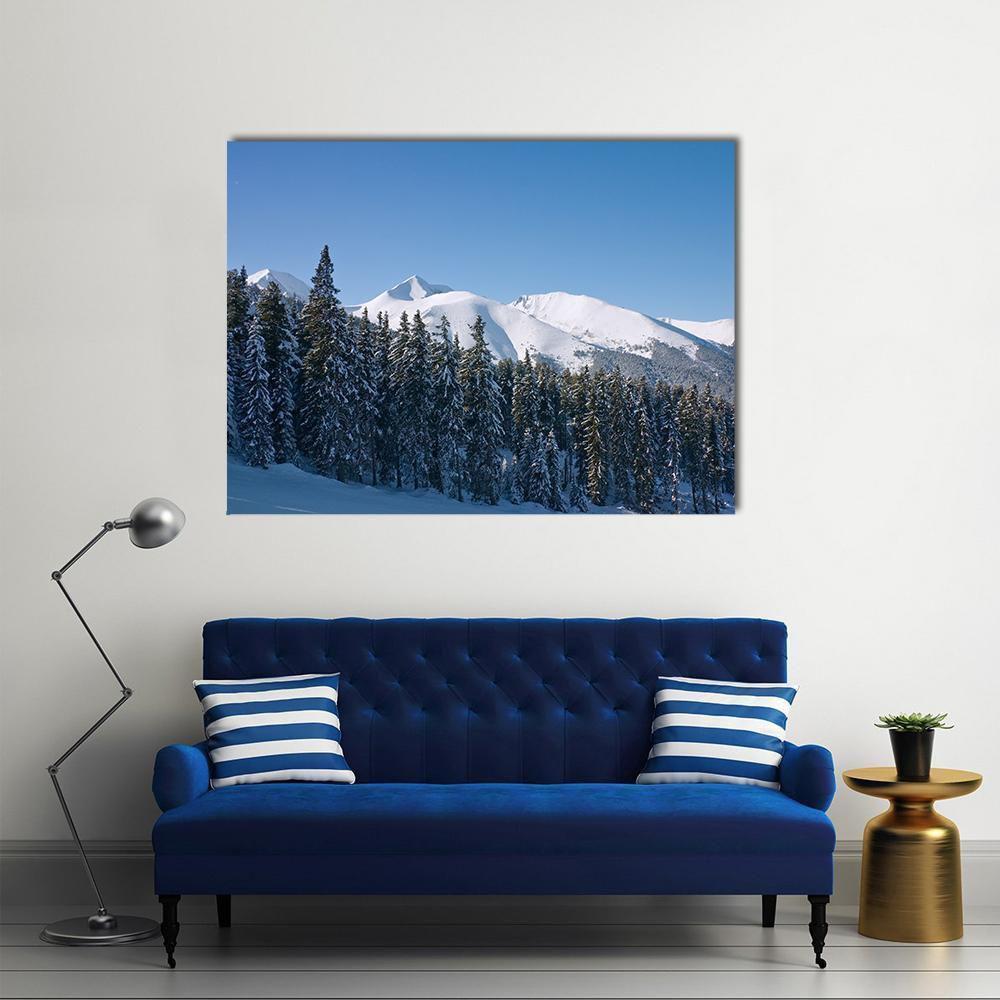 Bansko Ski Resort Winter Landscape Canvas Wall Art in white, green and blue, single panel hung on a wall