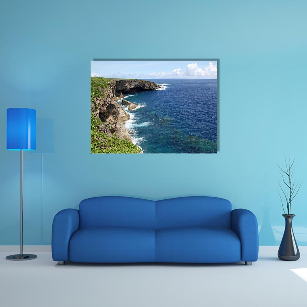 Banzai Cliff Coastal Seascape Canvas Wall Art in gray, green and blue, single panel hung on a wall