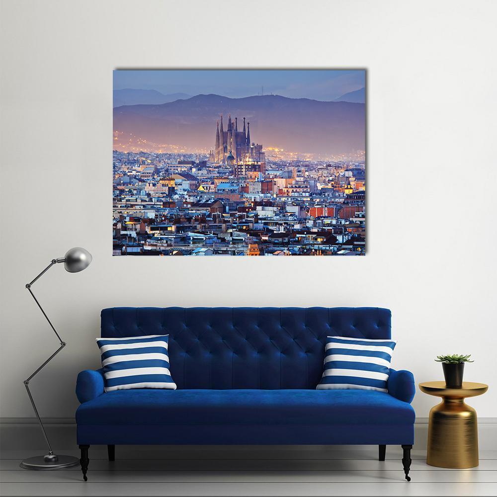 Barcelona Skyline at Twilight Canvas Wall Art in yellow, blue and purple, single panel hung on a wall