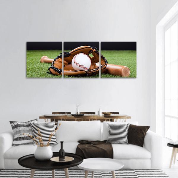 Baseball Glove and Ball on Bat Panoramic Canvas Wall Art in black, brown and green, hung on a wall